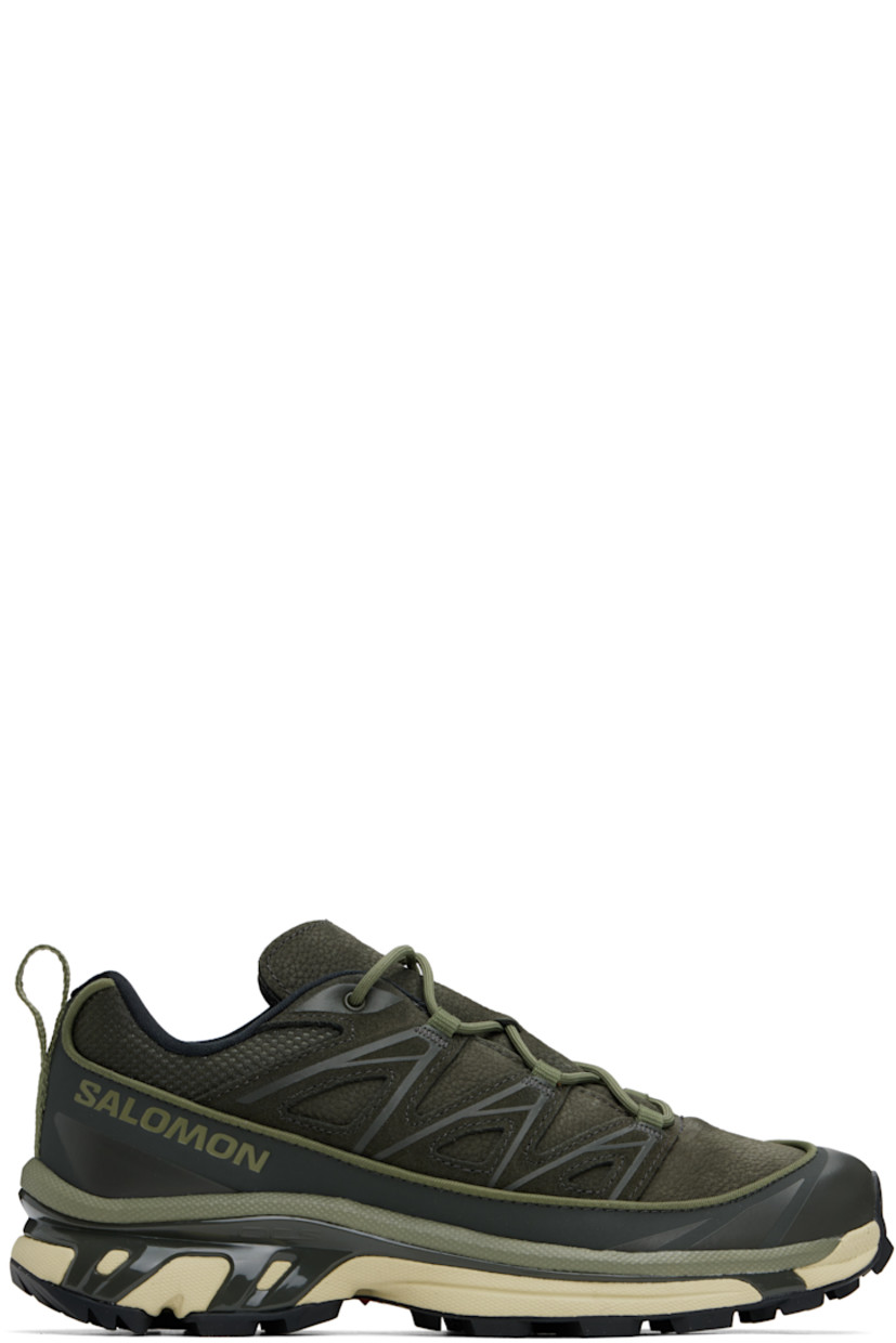 Low-top suede, grained leather, and mesh sneakers in khaki.

· Piping throughout
· Cap toe
· Lace-up closure
· Logo printed at tongue and outer side
· Padded tongue and collar
· SensiFit™ panel at sides
· Pull-loop with reflective trim at heel tab
· Molded OrthoLite® footbed
· Jersey lining
· Foam rubber EnergyCell midsole 
· Agile Chassis™ System at midsole
· Treaded Mud Contagrip® rubber sole

Supplier color: Peat/Deep lichen green/Green haze