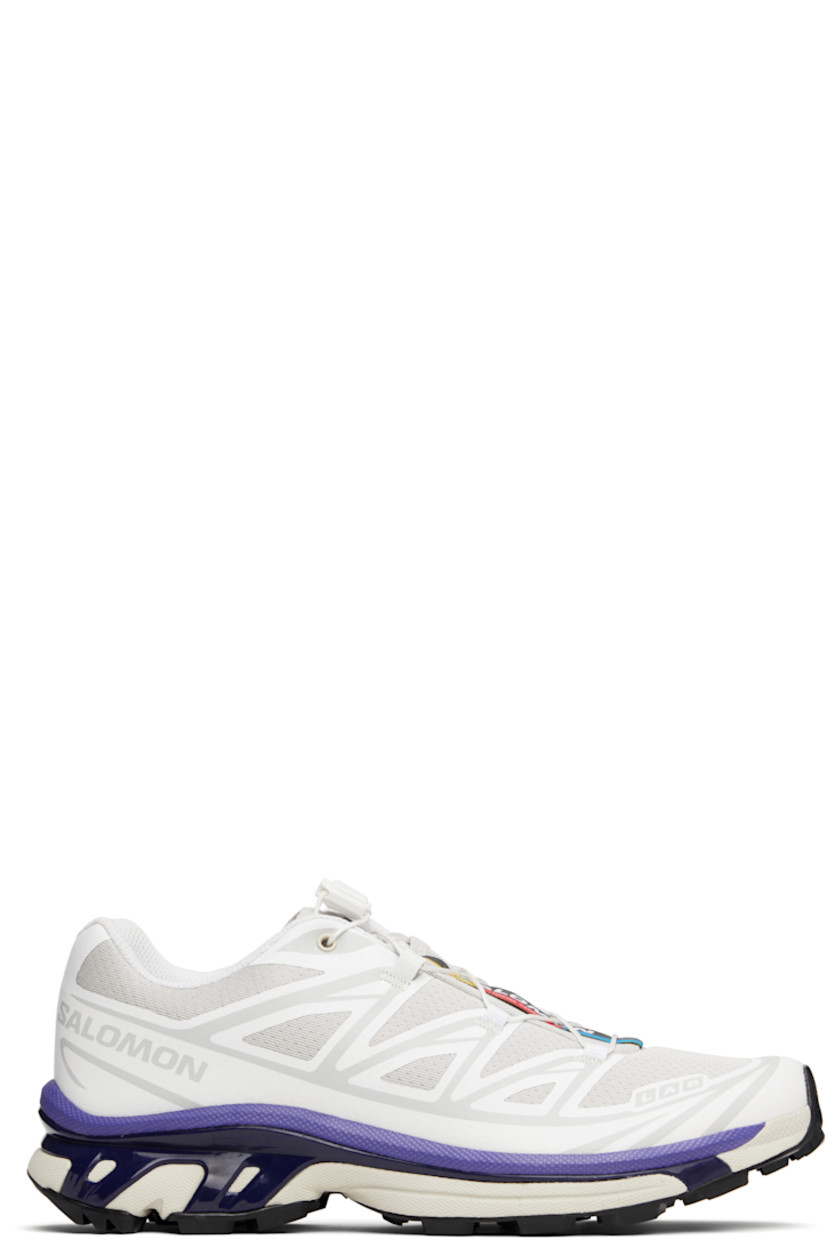 Low-top lightweight mesh sneakers in white and gray.

· Bonded trim throughout
· Logo embossed at toe
· Quicklace™ closure
· Logo patch at vamp
· Logo-woven pull-loop at padded tongue
· Padded collar
· Bonded sensiFIT™ panel at sides
· Logo printed at outer side
· Text printed at inner side
· Molded OrthoLite® insole
· EndoFit™ mesh lining
· Agile Chassis™ System at EnergyCell midsole
· Treaded Mud Contagrip® rubber sole

Supplier color: White/Lunar rock/Liberty