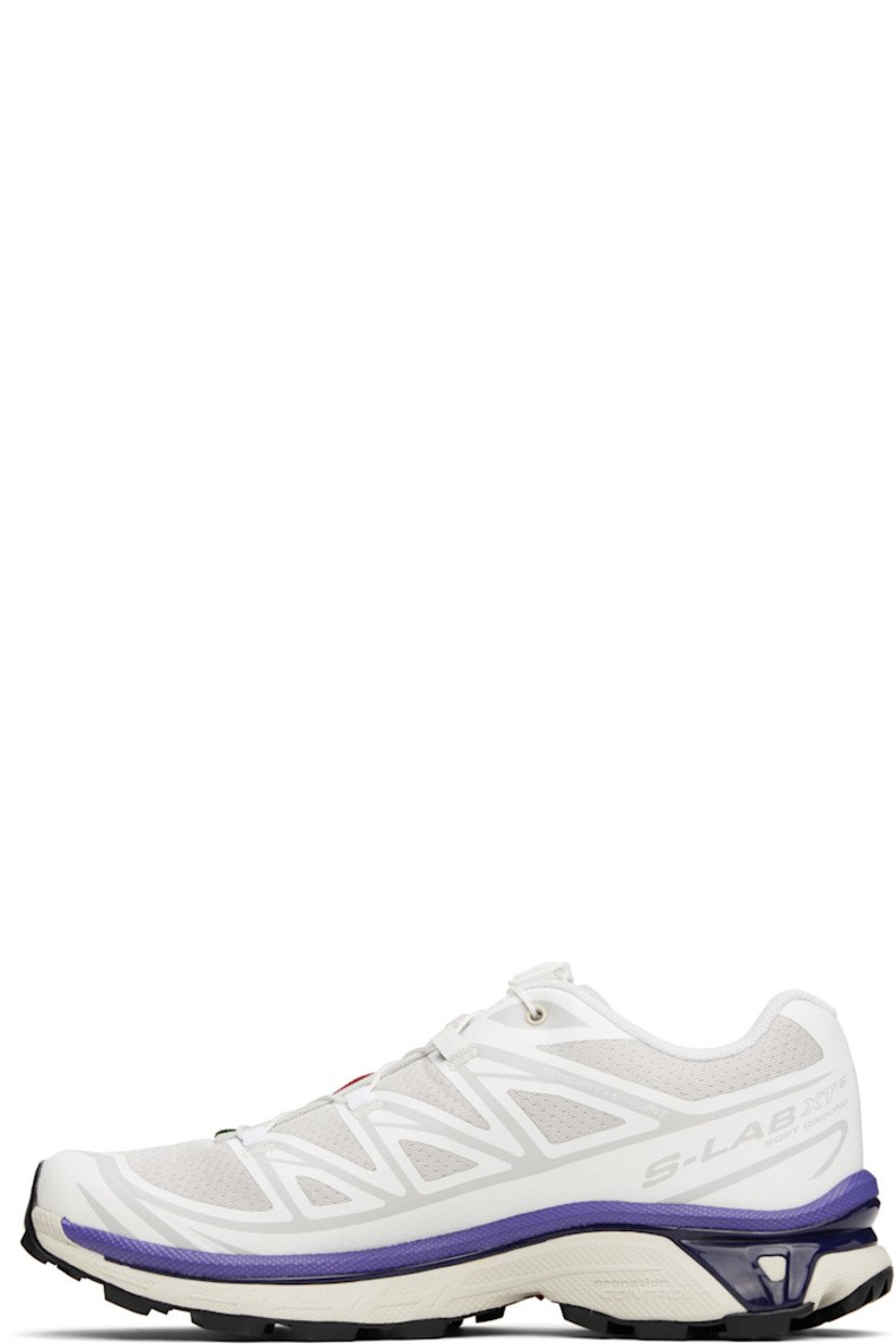 Low-top lightweight mesh sneakers in white and gray.

· Bonded trim throughout
· Logo embossed at toe
· Quicklace™ closure
· Logo patch at vamp
· Logo-woven pull-loop at padded tongue
· Padded collar
· Bonded sensiFIT™ panel at sides
· Logo printed at outer side
· Text printed at inner side
· Molded OrthoLite® insole
· EndoFit™ mesh lining
· Agile Chassis™ System at EnergyCell midsole
· Treaded Mud Contagrip® rubber sole

Supplier color: White/Lunar rock/Liberty
