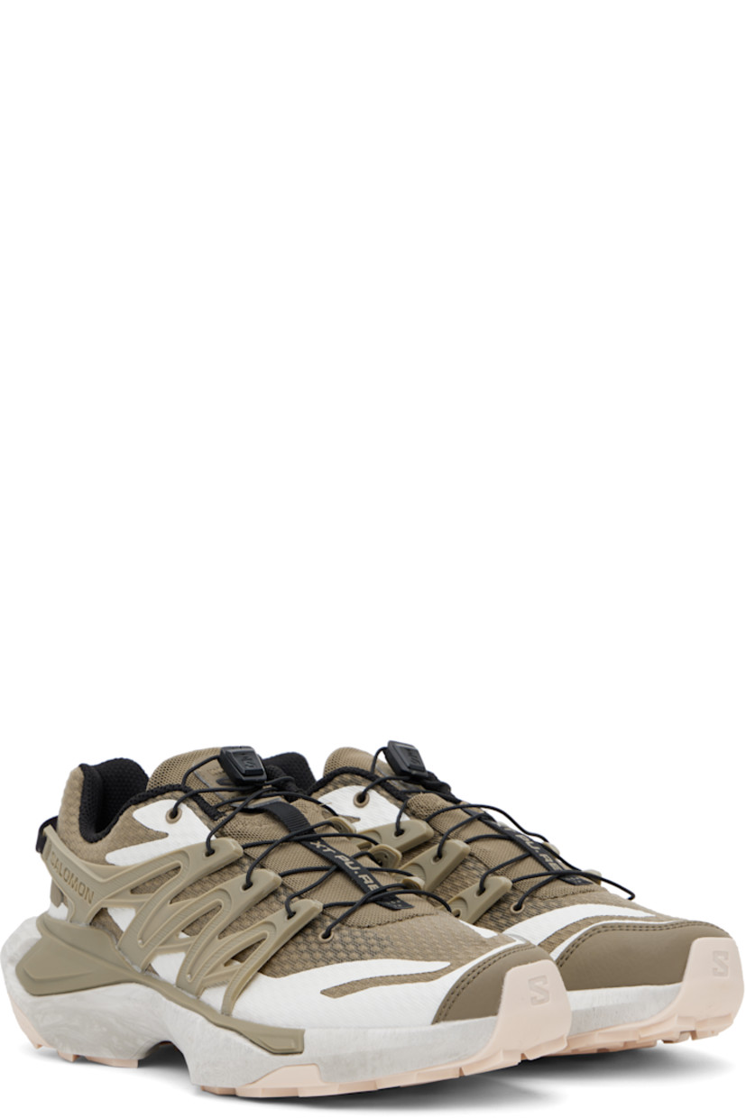 Low-top mesh sneakers in khaki.

· Bonded trim throughout
· Quicklace™ closure
· Logo patch at padded tongue
· Padded collar
· Logo embossed at outer side
· SensiFit™ panel at sides
· Pull-loop at heel tab
· EndoFit™ mesh lining
· infiniFOAM rubber midsole
· Treaded All Terrain Contagrip® rubber sole
· Advanced Chassis™ System at sole

Supplier color: Fallen rock/Stone gray/Vanilla ice