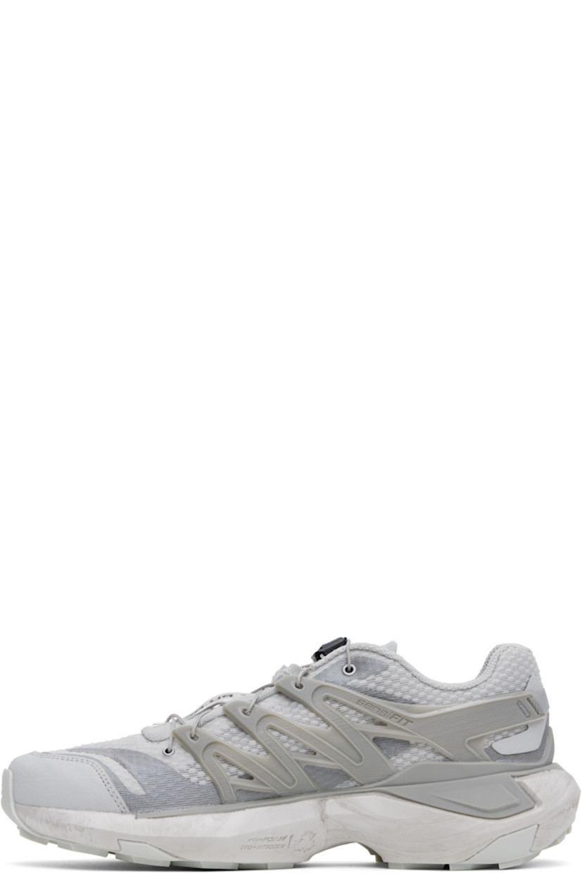 Low-top anti-debris 3D mesh and grained faux-leather sneakers in gray.

· Bonded trim and printed graphic pattern throughout
· Quicklace™ closure
· Logo patch at vamp
· Logo-embossed pull-tab at padded tongue
· Padded collar
· Logo-embossed rubber SensiFit™ panel at sides
· Molded OrthoLite® footbed
· EndoFit™ mesh lining
· infiniFOAM foam rubber midsole
· Advanced Chassis™ system at midsole
· Treaded All Terrain Contagrip® rubber sole

Supplier color: Gray violet/Flint gray/Sharkskin