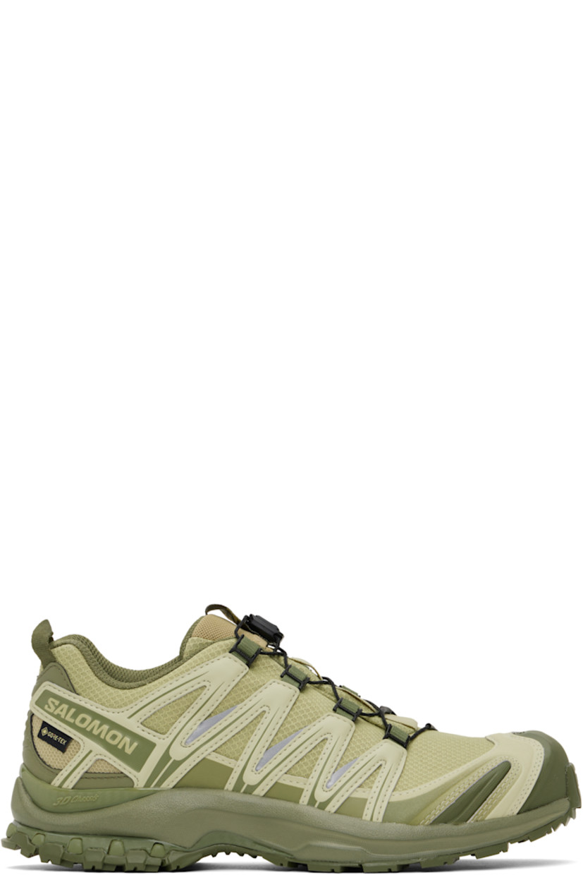 Low-top mesh and buffed faux-leather sneakers in green.

· Certified OEKO-Tex® Standard and Bluesign® 
· GORE-TEX™ ePE waterproof membrane, PFC-free
· Quicklace™ closure
· Logo-woven pull-loop at tongue
· Logo patch at padded tongue
· Padded collar
· Reflective trim and logo flag at outer side
· Logo and text embossed at sides and heel
· Pull-loop at heel tab
· Molded OrthoLite® footbed
· 3D Advanced Chassis™ foam rubber midsole
· Treaded All Terrain Contagrip® rubber outsole

Supplier color: Gray green/Alfalfa/Deep lichen green