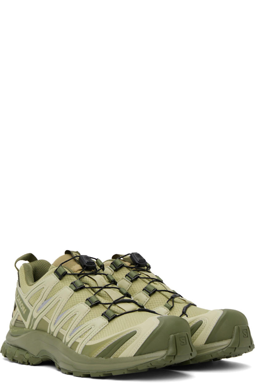 Low-top mesh and buffed faux-leather sneakers in green.

· Certified OEKO-Tex® Standard and Bluesign® 
· GORE-TEX™ ePE waterproof membrane, PFC-free
· Quicklace™ closure
· Logo-woven pull-loop at tongue
· Logo patch at padded tongue
· Padded collar
· Reflective trim and logo flag at outer side
· Logo and text embossed at sides and heel
· Pull-loop at heel tab
· Molded OrthoLite® footbed
· 3D Advanced Chassis™ foam rubber midsole
· Treaded All Terrain Contagrip® rubber outsole

Supplier color: Gray green/Alfalfa/Deep lichen green