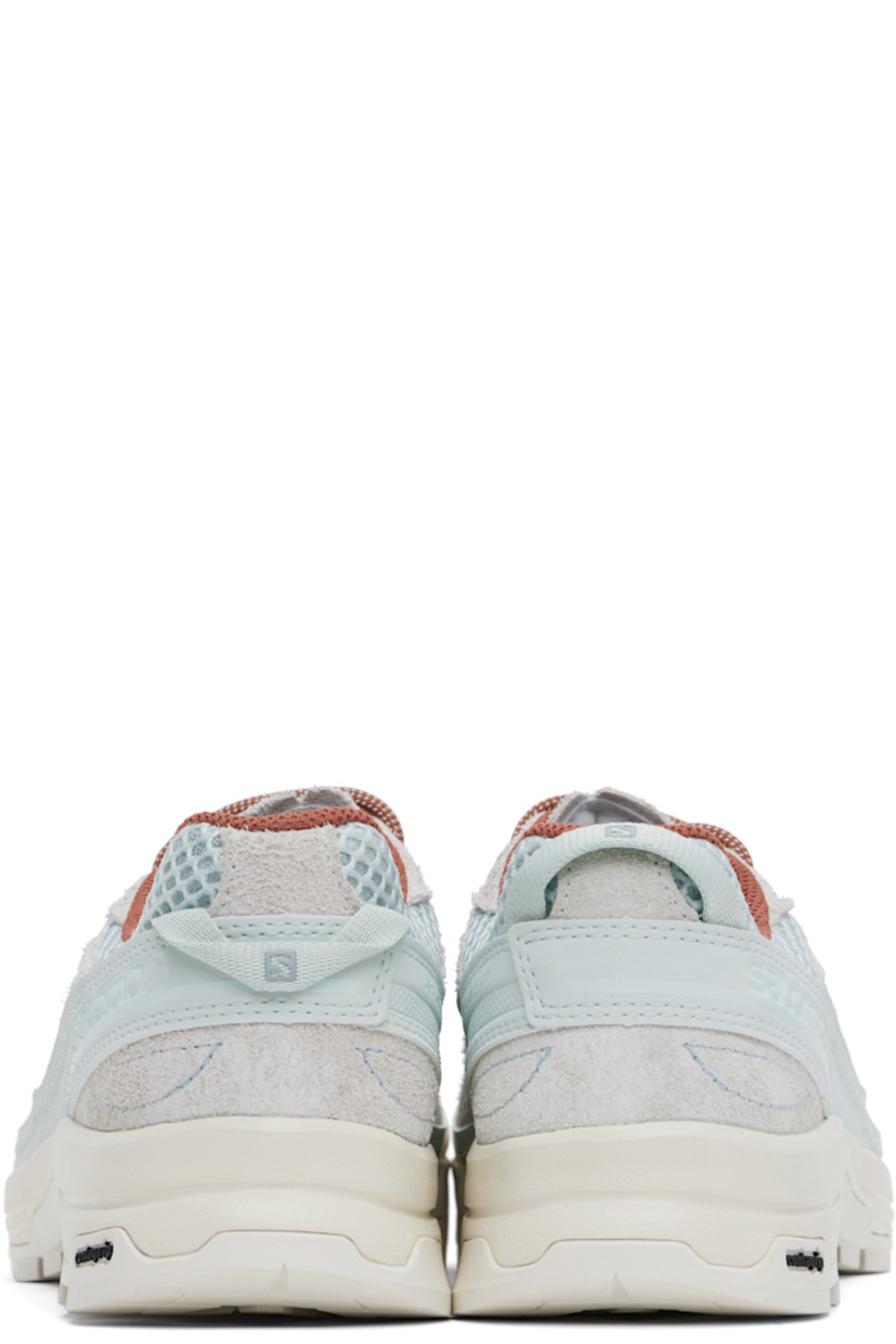 Low-top mesh and suede sneakers in gray and blue.

· Rubber cap toe
· Lace-up closure
· Logo printed at padded tongue
· Padded collar
· Logo embossed at outer side
· Pull-loop with reflective logo at heel
· Cushioned Ortholite® insole
· Mesh lining
· 3D Edging Chassis™ rubber midsole
· Treaded Contagrip® rubber sole

Supplier color: Ice flow/Quarry/Russet