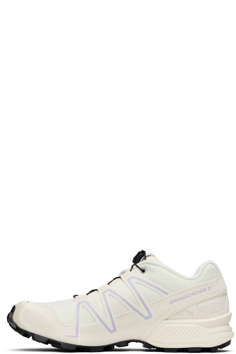 Low-top lightweight ripstop and buffed faux-leather sneakers in off-white.

· Quicklace™ closure
· Logo-embroidered pull-loop at padded tongue
· Padded collar
· sensiFIT™ panel at sides
· Text printed at sides
· Logo embossed at outer side
· Molded OrthoLite® insole
· Mesh lining
· Foam rubber midsole
· Treaded Mud Contagrip® rubber sole

Supplier color: Vanilla ice/Cosmic sky/Black