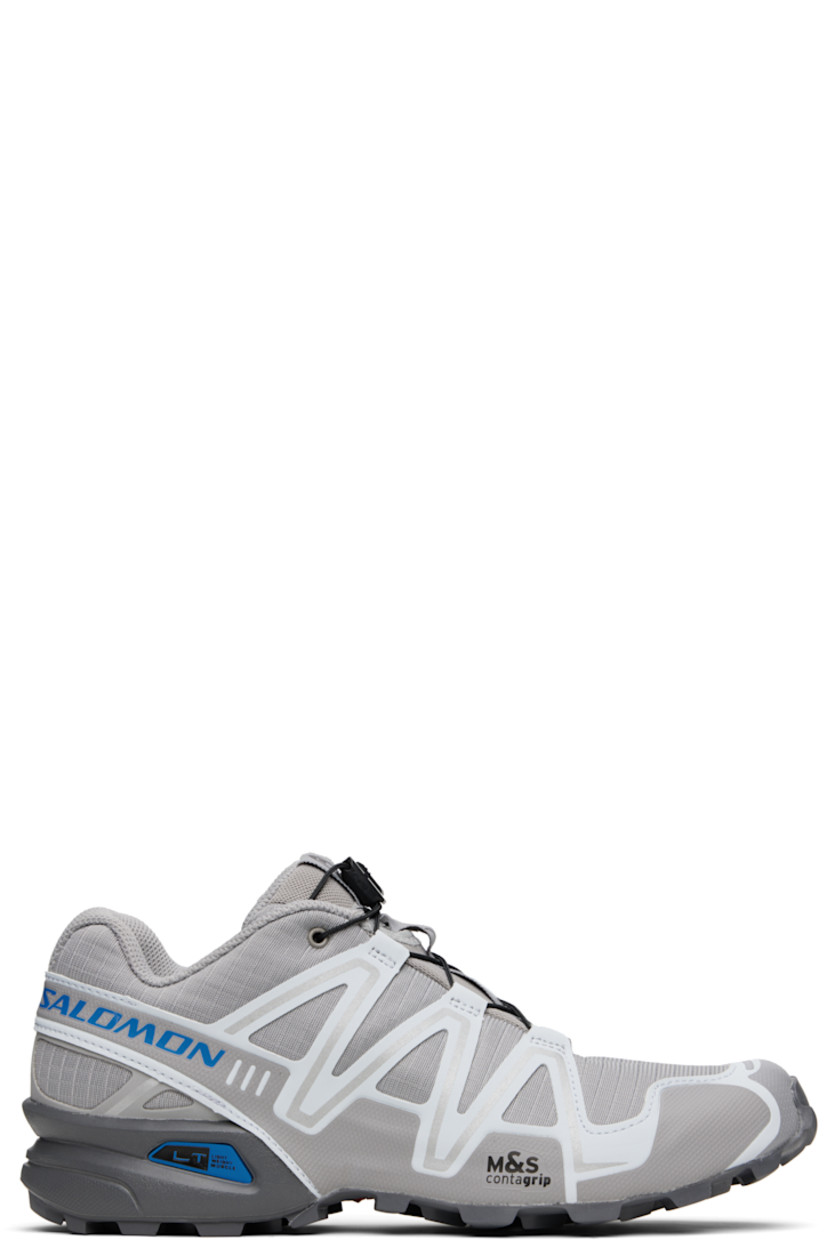 Low-top lightweight ripstop and buffed faux-leather sneakers in gray.

· Quicklace™ closure
· Logo-embroidered pull-loop at padded tongue
· Padded collar
· sensiFIT™ panel at sides
· Text printed at sides
· Logo embossed at outer side
· Molded OrthoLite® insole
· Mesh lining
· Foam rubber midsole
· Treaded Mud Contagrip® rubber sole

Supplier color: Alloy/Ballad blue/Castlerock