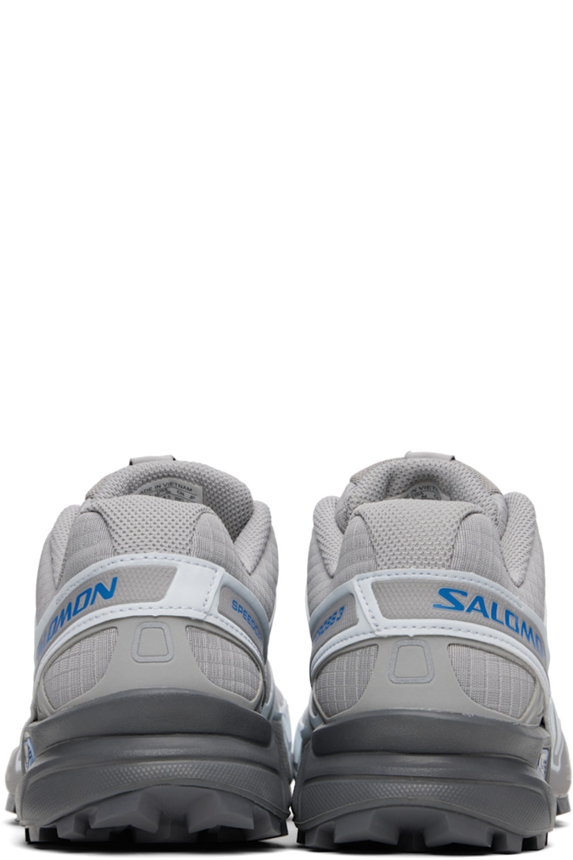 Low-top lightweight ripstop and buffed faux-leather sneakers in gray.

· Quicklace™ closure
· Logo-embroidered pull-loop at padded tongue
· Padded collar
· sensiFIT™ panel at sides
· Text printed at sides
· Logo embossed at outer side
· Molded OrthoLite® insole
· Mesh lining
· Foam rubber midsole
· Treaded Mud Contagrip® rubber sole

Supplier color: Alloy/Ballad blue/Castlerock