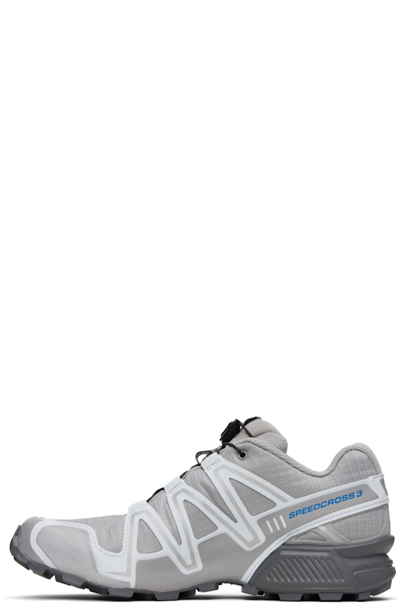 Low-top lightweight ripstop and buffed faux-leather sneakers in gray.

· Quicklace™ closure
· Logo-embroidered pull-loop at padded tongue
· Padded collar
· sensiFIT™ panel at sides
· Text printed at sides
· Logo embossed at outer side
· Molded OrthoLite® insole
· Mesh lining
· Foam rubber midsole
· Treaded Mud Contagrip® rubber sole

Supplier color: Alloy/Ballad blue/Castlerock