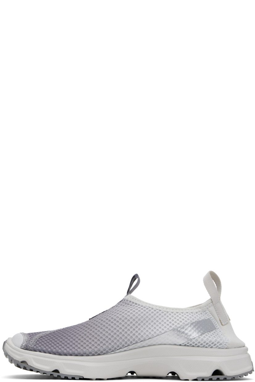 Low-top lightweight mesh sneakers in gray and silver tone.

· Gradient pattern throughout
· Reflective logo bonded at vamp
· Logo-woven pull-loop at vamp
· Elasticized collar
· Pull-loop with reflective logo at heel
· Foam rubber midsole
· Treaded Contagrip® rubber sole

Supplier color: Glacier gray/Sharkskin/Silver metallic x
