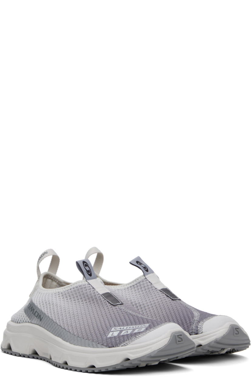 Low-top lightweight mesh sneakers in gray and silver tone.

· Gradient pattern throughout
· Reflective logo bonded at vamp
· Logo-woven pull-loop at vamp
· Elasticized collar
· Pull-loop with reflective logo at heel
· Foam rubber midsole
· Treaded Contagrip® rubber sole

Supplier color: Glacier gray/Sharkskin/Silver metallic x