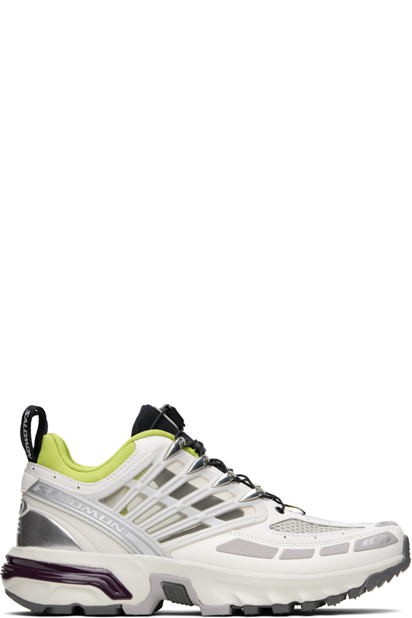Low-top textured faux-leather and mesh sneakers in gray.

· Rubberized trim throughout
· Logo printed at toe and outer side
· Quicklace® closure
· Logo patch at padded tongue
· Padded collar
· sensiFIT™ and sheer mesh panel at sides
· Logo-bonded pull-loops at heel tab
· Logo embossed at heel counter
· Molded OrthoLite® insole
· Jersey lining
· Agile Chassis™ System at rubber EnergyCell midsole
· Treaded All Terrain Contagrip® rubber sole

Supplier color: Lunar rock/Plum perfect/Dark citron