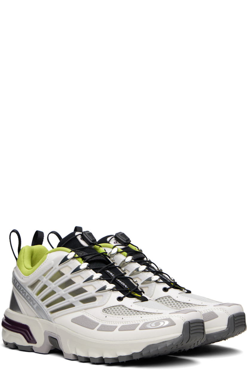 Low-top textured faux-leather and mesh sneakers in gray.

· Rubberized trim throughout
· Logo printed at toe and outer side
· Quicklace® closure
· Logo patch at padded tongue
· Padded collar
· sensiFIT™ and sheer mesh panel at sides
· Logo-bonded pull-loops at heel tab
· Logo embossed at heel counter
· Molded OrthoLite® insole
· Jersey lining
· Agile Chassis™ System at rubber EnergyCell midsole
· Treaded All Terrain Contagrip® rubber sole

Supplier color: Lunar rock/Plum perfect/Dark citron