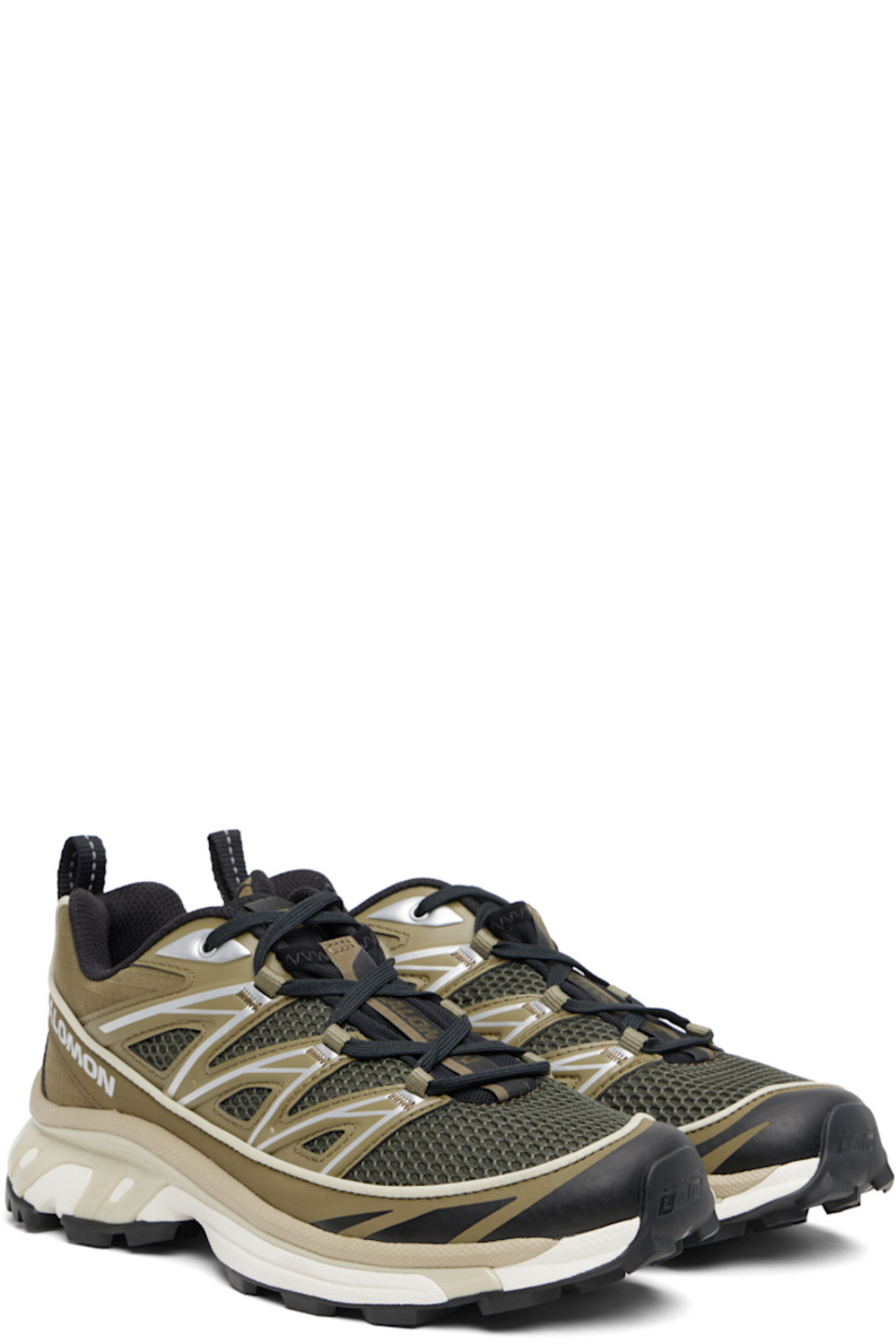 Low-top mesh and ripstop sneakers.

· Piping throughout
· Logo embossed at toe
· Lace-up closure
· Logo patch at vamp and tongue
· Padded collar
· Reflective pull-loop at heel tab
 · sensiFIT™ panel at sides
· Text printed at inner side
· Logo embossed at outer side
· Molded OrthoLite® insole
· EndoFit™ mesh lining
· Agile Chassis™ System at EnergyCell midsole
· Treaded Mud Contagrip® rubber sole

Supplier color: Martini Olive/Olive Night/Ftw Silver