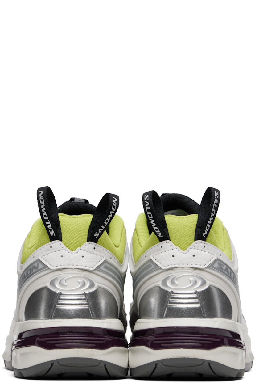 Low-top textured faux-leather and mesh sneakers in gray.

· Rubberized trim throughout
· Logo printed at toe and outer side
· Quicklace® closure
· Logo patch at padded tongue
· Padded collar
· sensiFIT™ and sheer mesh panel at sides
· Logo-bonded pull-loops at heel tab
· Logo embossed at heel counter
· Molded OrthoLite® insole
· Jersey lining
· Agile Chassis™ System at EnergyCell midsole
· Treaded All Terrain Contagrip® rubber sole

Supplier color: Lunar rock/Plum perfect/Dark citron