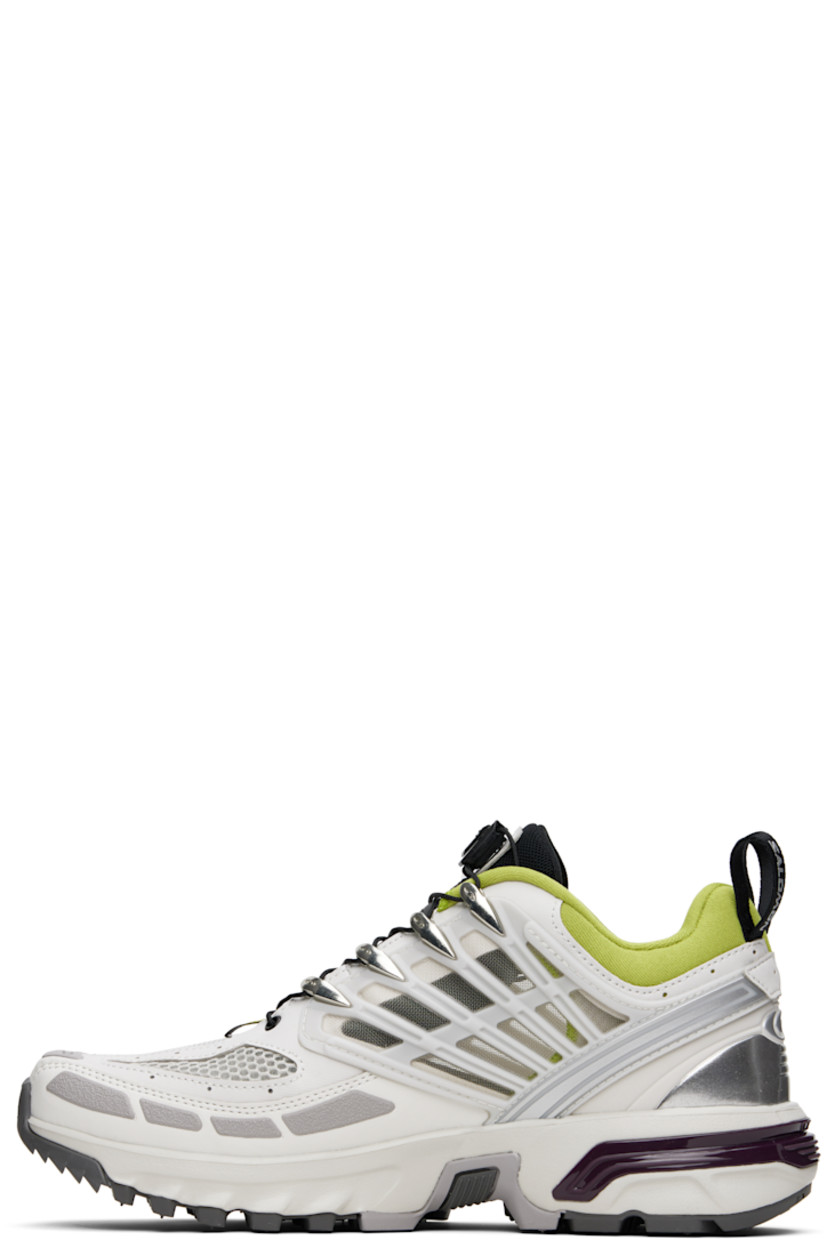Low-top textured faux-leather and mesh sneakers in gray.

· Rubberized trim throughout
· Logo printed at toe and outer side
· Quicklace® closure
· Logo patch at padded tongue
· Padded collar
· sensiFIT™ and sheer mesh panel at sides
· Logo-bonded pull-loops at heel tab
· Logo embossed at heel counter
· Molded OrthoLite® insole
· Jersey lining
· Agile Chassis™ System at EnergyCell midsole
· Treaded All Terrain Contagrip® rubber sole

Supplier color: Lunar rock/Plum perfect/Dark citron