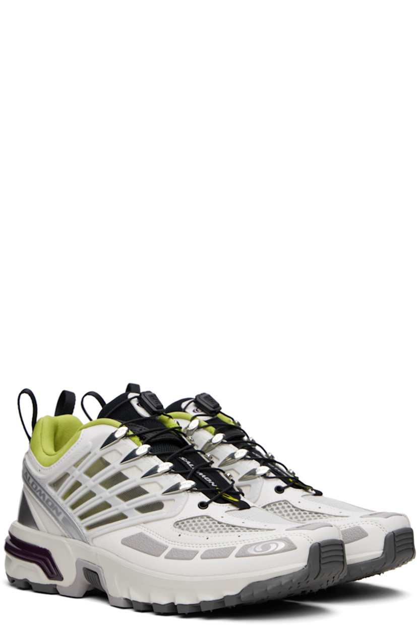 Low-top textured faux-leather and mesh sneakers in gray.

· Rubberized trim throughout
· Logo printed at toe and outer side
· Quicklace® closure
· Logo patch at padded tongue
· Padded collar
· sensiFIT™ and sheer mesh panel at sides
· Logo-bonded pull-loops at heel tab
· Logo embossed at heel counter
· Molded OrthoLite® insole
· Jersey lining
· Agile Chassis™ System at EnergyCell midsole
· Treaded All Terrain Contagrip® rubber sole

Supplier color: Lunar rock/Plum perfect/Dark citron