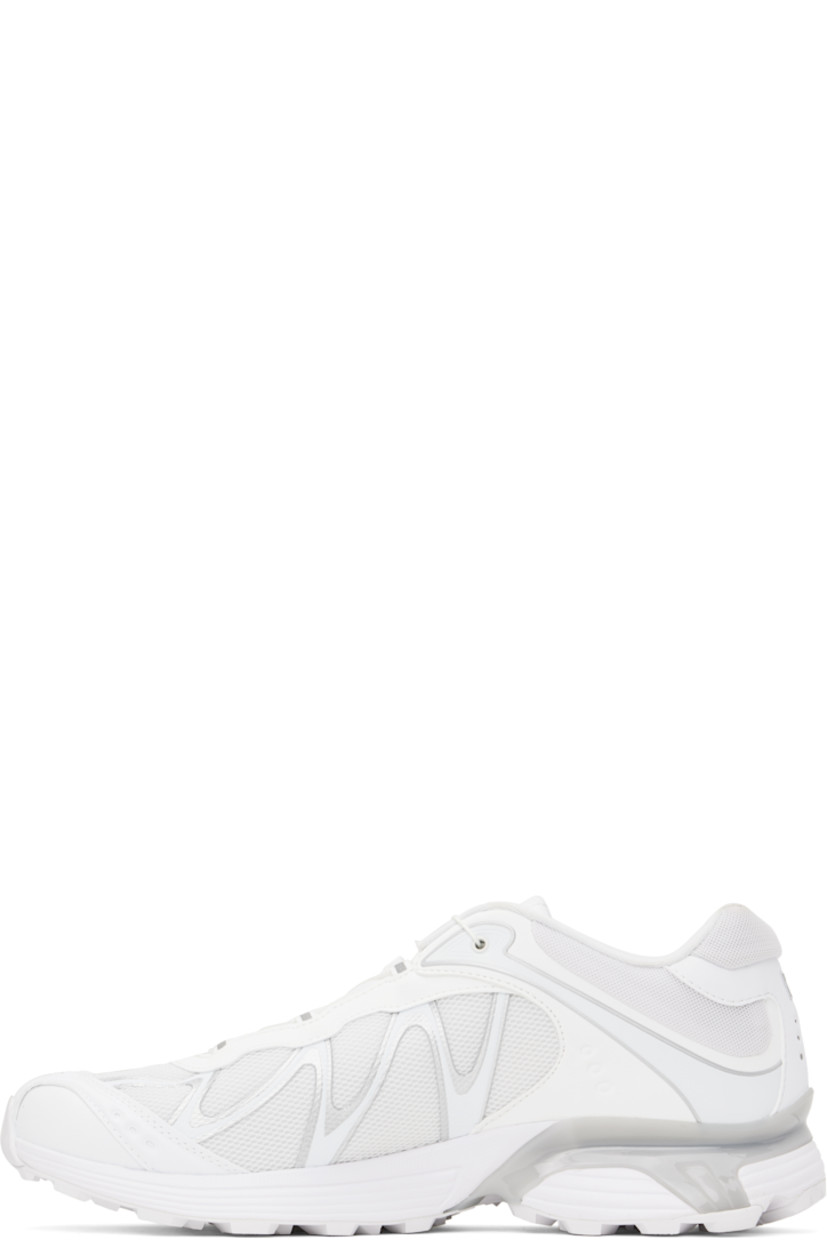 Low-top mesh and faux-nubuck sneakers in white.

· Reflective detailing throughout
· Perforated detailing and embossed logo at toe
· Quicklace™ closure
· Logo patch at padded tongue
· Padded collar
· Sensifit™ panel at sides
· Logo printed at outer side and heel tab
· Molded OrthoLite® insole
· Mesh lining
· Agile Chassis™ System at foam rubber midsole
· Treaded Mud Contagrip® rubber sole

Supplier color: White/Lunar rock/Ftw silver