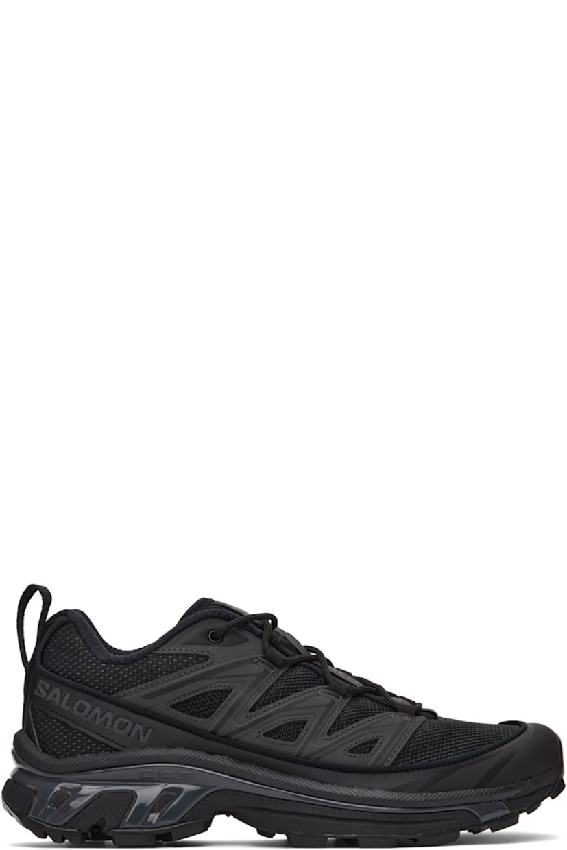Low-top mesh and faux-leather sneakers in black.

· Reflective trim throughout
· Lace-up closure
· Logo patch at vamp 
· Logo-woven pull-loop at padded tongue
· Bonded sensiFit™ panel at sides
· Logos printed at inner side
· Logo embossed at outer side
· Pull-loop at heel tab
· Molded OrthoLite® footbed
· Breathable EndoFit™ mesh lining
· Agile Chassis™ System at foam rubber EnergyCell midsole
· Treaded Mud Contagrip® rubber sole

Supplier color: Black/Ebony/Magnet