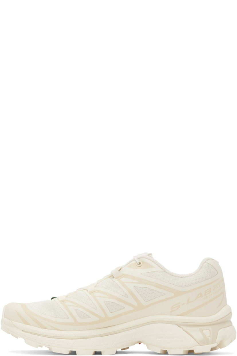 Low-top lightweight mesh sneakers in off-white.

· Quicklace™ closure
· Logo patch at vamp
· Logo-woven pull-loop at padded tongue
· Padded collar
· Logo and text printed at sides
· Bonded sensiFit™ panel at sides
· EndoFit™ mesh lining
· Molded OrthoLite® footbed
· Agile Chassis™ System at foam rubber EnergyCell midsole
· Treaded Mud Contagrip® rubber sole

Supplier color: Vanilla ice/Almond milk