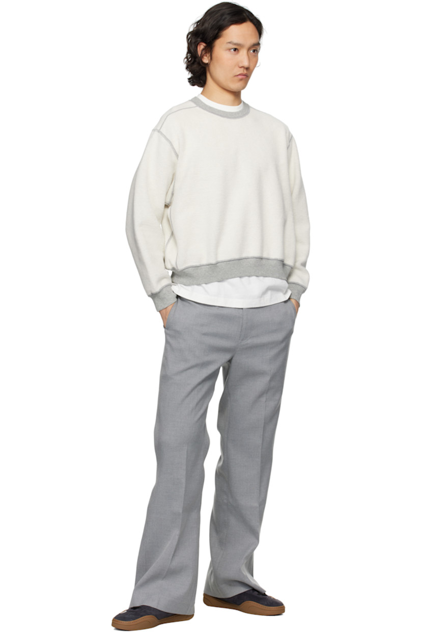 Reversible preshrunk 13 oz cotton fleece sweatshirt.

Reverse in gray cotton fleece.

· Boxy-fit
· Rib-knit crewneck, cropped hem, and cuffs
· Gusset at shoulders and side seams
· Dropped shoulders

Supplier color: Heather grey
