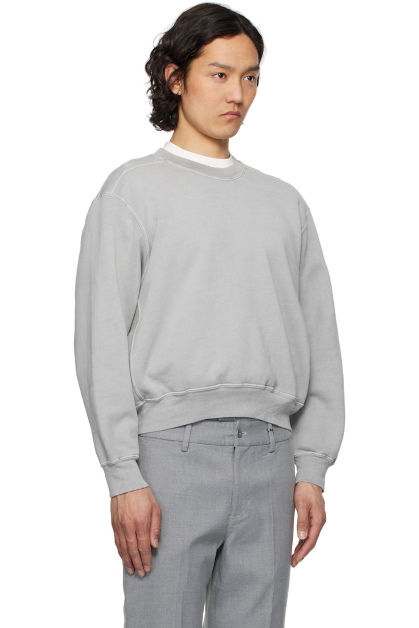 Preshrunk 13 oz cotton fleece sweatshirt.

· Boxy-fit
· Rib-knit crewneck, cropped hem, and cuffs
· Gusset at shoulders and side seams
· Dropped shoulders

Supplier color: Pigment chalk