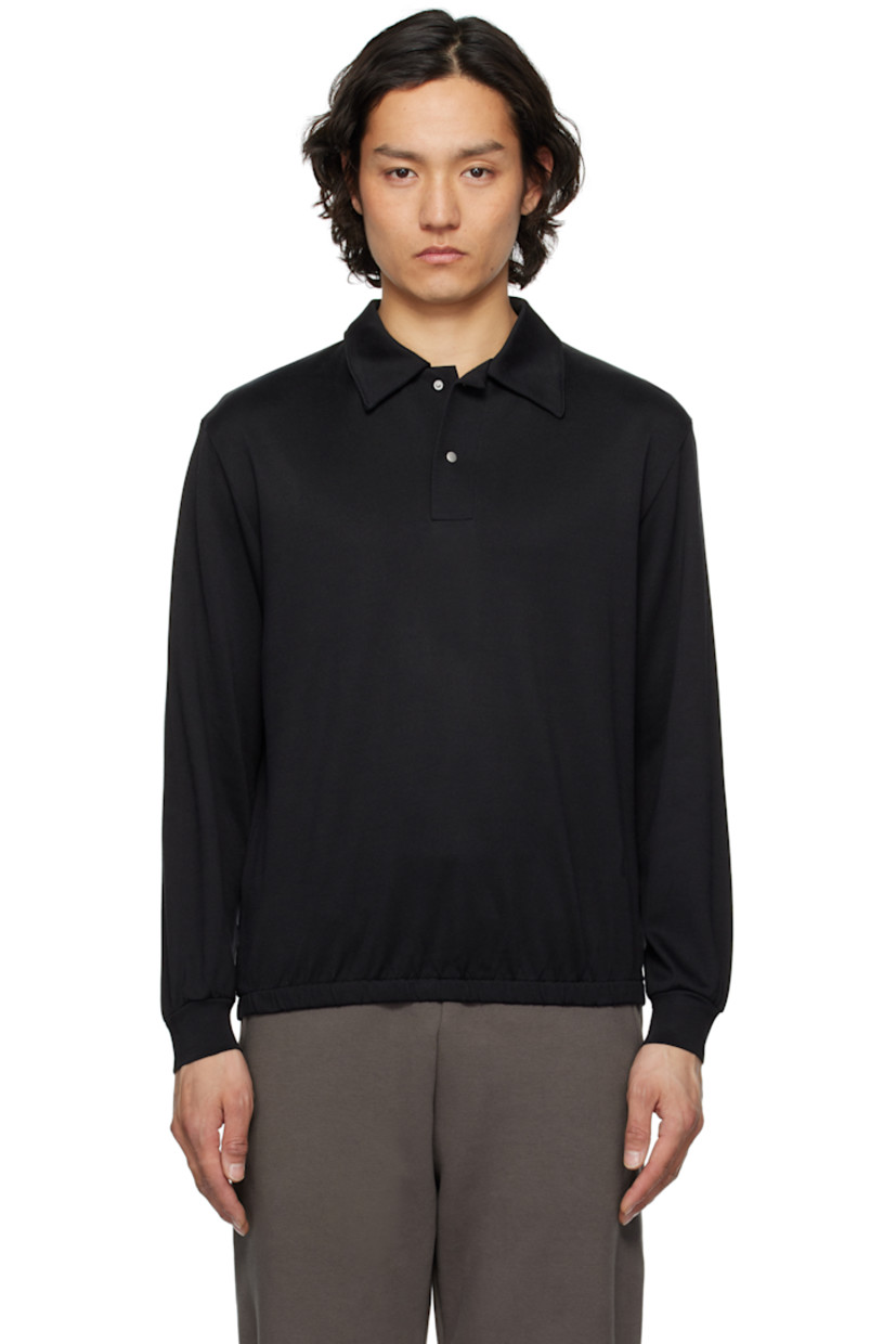 Preshrunk cotton- and rayon-blend jersey polo.

· Lightweight
· Rounded, boxy-fit
· Spread collar
· Two-button press-stud placket
· Elasticized hem

Supplier color: Black