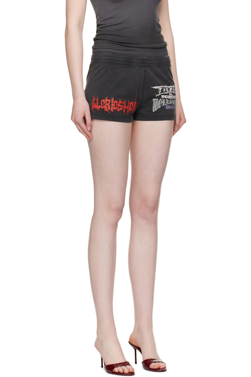 Organic cotton jersey shorts. Fading throughout.

· Concealed drawstring at elasticized waistband
· Logo embroidered and printed at front
· Text printed at front and back
· Vented outseams

Supplier color: Faded black