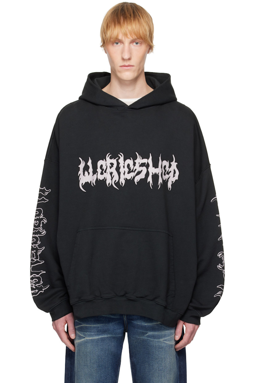 Oversized organic cotton French terry hoodie. Fading and subtle distressing throughout.

· Logo and text printed at hood
· Screen-printed text at chest and sleeves
· Kangaroo pocket
· Rib-knit hem and cuffs
· Dropped shoulders
· Logo embroidered at back

Supplier color: Washed black