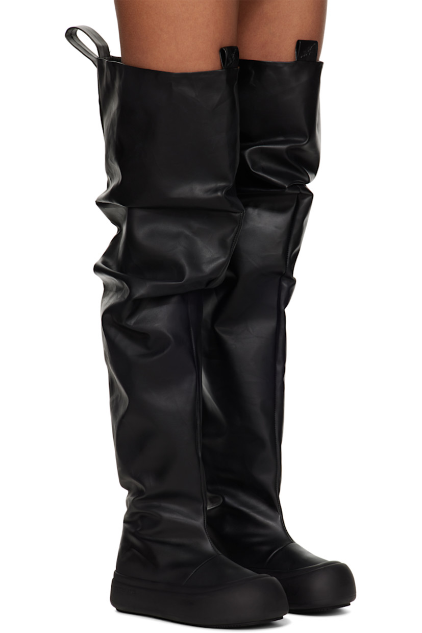 Thigh-high buffed faux-leather boots in black.

· Gathering throughout
· Logo-embossed pull-loops at collar
· Buffed faux-leather lining
· Rubberized trim at welt
· Logo embossed at midsole
· Treaded recycled rubber sole

Supplier color: Black