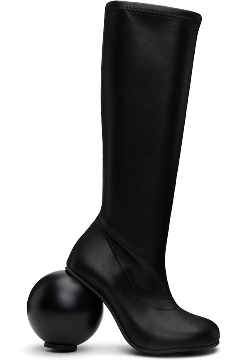 Knee-high grained faux-leather boots in black.

· Zip closure at inner side
�· Sculptural heel with rubber injection
· Neolite rubber sole
· Heel: H3.75"

Supplier color: Black
