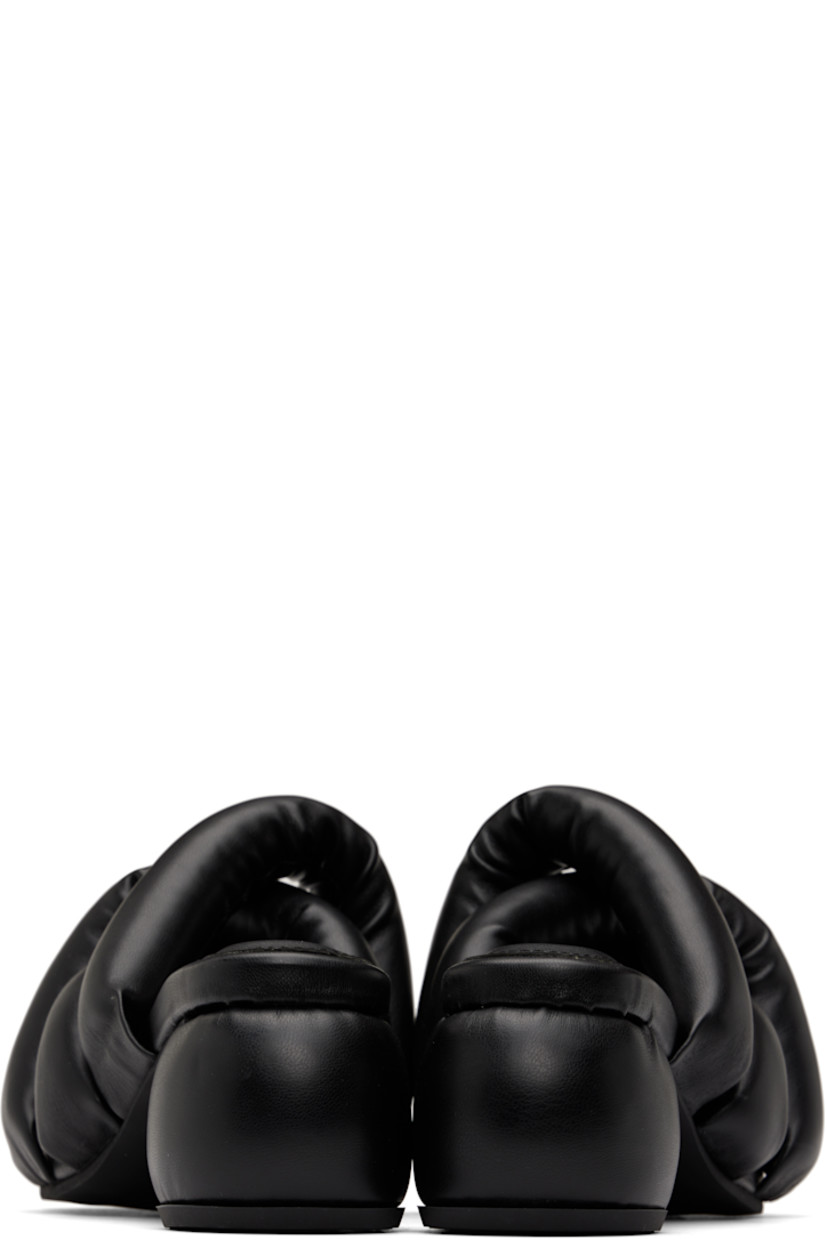 Padded buffed faux-leather slip-on heeled sandals in black.

· Open square toe
· Crisscrossing straps at vamp
· Logo-embossed padded footbed
· Covered block heel
· Treaded rubber sole
· Heel: H2.5"

Supplier color: Black