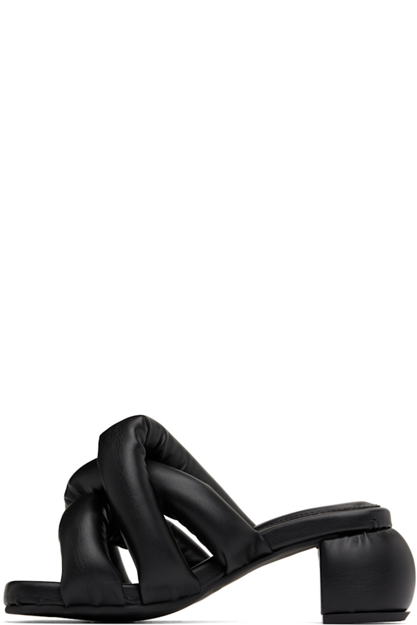 Padded buffed faux-leather slip-on heeled sandals in black.

· Open square toe
· Crisscrossing straps at vamp
· Logo-embossed padded footbed
· Covered block heel
· Treaded rubber sole
· Heel: H2.5"

Supplier color: Black