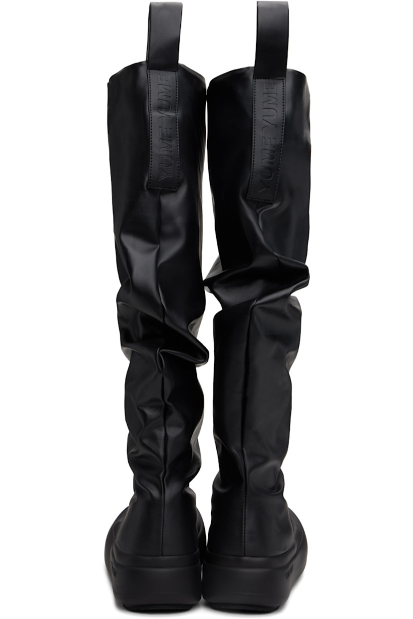Knee-high buffed faux-leather boots in black.

· Gathering throughout
· Rubber cap toe
· Logo-embossed pull-loops at collar
· Padded footbed
· Grained faux-leather lining
· Logo-embossed rubber platform midsole
· Treaded rubber sole
· Platform: H1.75"

Supplier color: Black