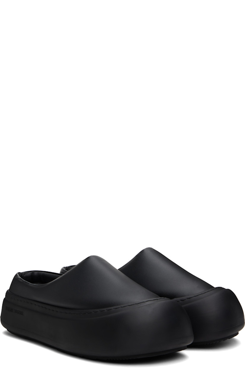 Padded buffed faux-leather slip-on loafers in black. 

· Rubber cap toe
· Logo stamp at molded footbed
· Grained faux-leather lining
· Logo-embossed rubber platform midsole
· Treaded rubber sole
· Platform: H2"

Supplier color: Black