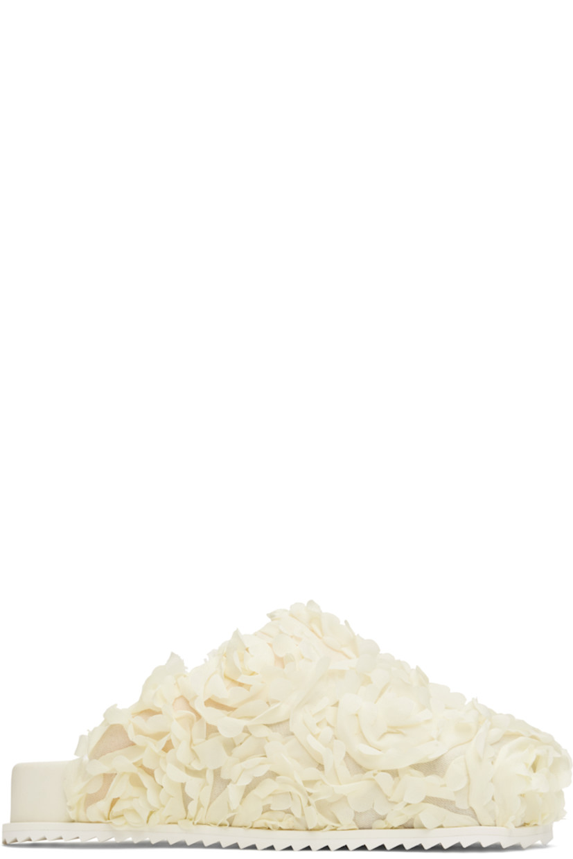 Mesh slip-on loafers in off-white.

· Floral appliqués throughout
· Square toe
· Logo printed at padded faux-leather footbed
· Grained faux-leather lining
· Treaded rubber sole

Supplier color: Crudo flower petals