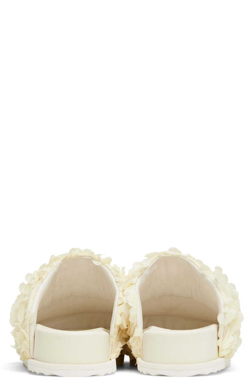 Mesh slip-on loafers in off-white.

· Floral appliqués throughout
· Square toe
· Logo printed at padded faux-leather footbed
· Grained faux-leather lining
· Treaded rubber sole

Supplier color: Crudo flower petals