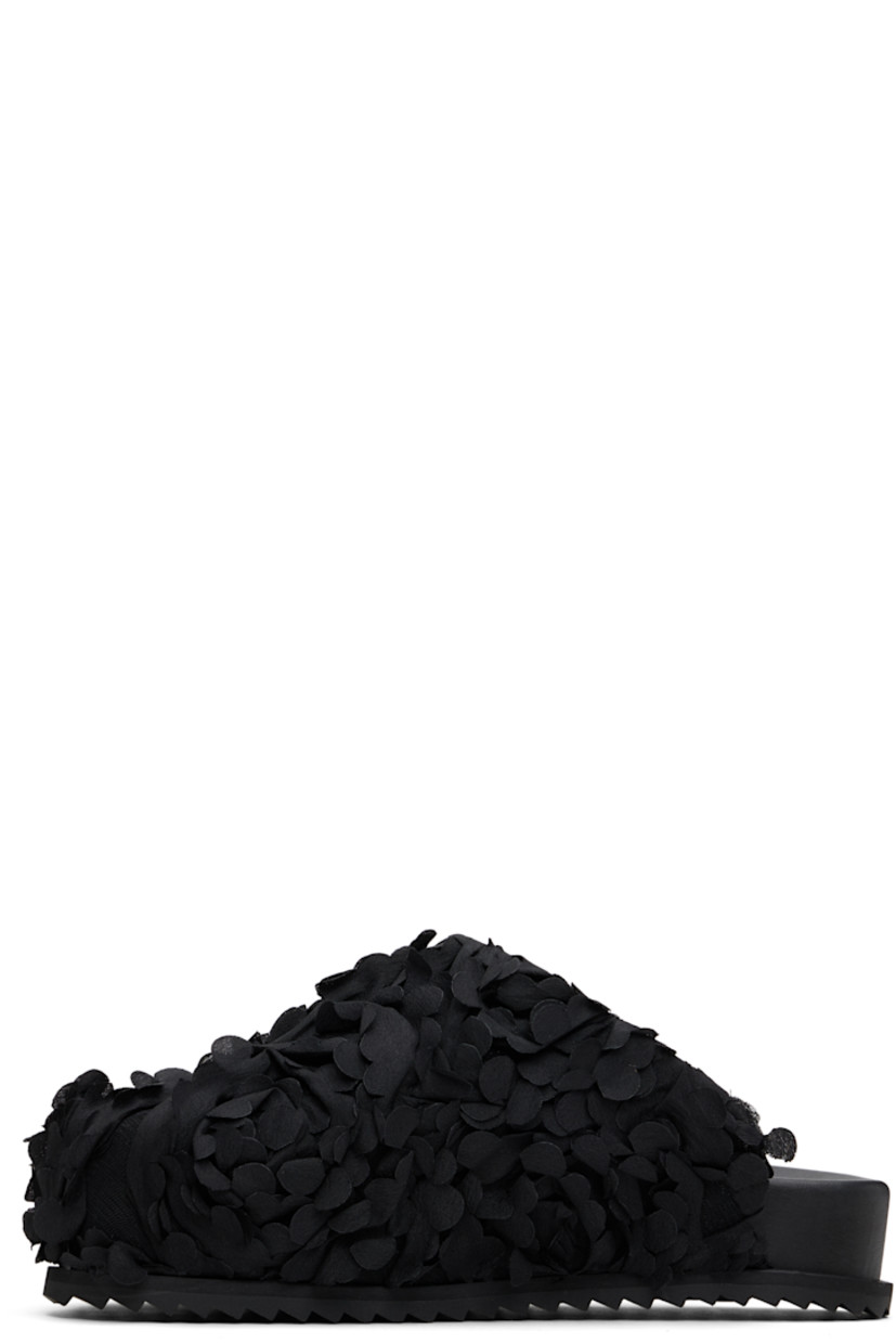 Mesh slip-on loafers in black.

· Floral appliqués throughout
· Square toe
· Logo printed at padded faux-leather footbed
· Grained faux-leather lining
· Treaded rubber sole

Supplier color: Black flower petals