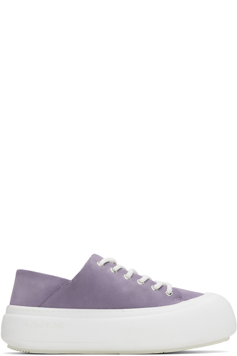 Low-top faux-suede sneakers in purple.

· Lace-up closure
· Padded tongue and collar
· Logo stamp at padded footbed
· Mesh and faux-nubuck lining
· Topstitching at welt
· Logo embossed at rubber platform midsole
· Treaded rubber sole
· Platform: H2"

Supplier color: Lila suede