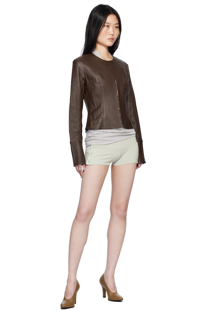 Stretch viscose jersey shorts.

· Elasticized waistband
· Press-stud vent at outseams

Supplier color: Silver