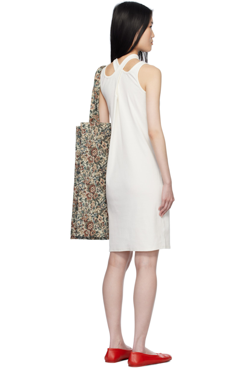 Cotton ribbed jersey midi dress. Twin shoulder straps for alternate styling.

· Modified crewneck
· Keyhole cutout
· Logo hardware at side hem

Supplier color: White