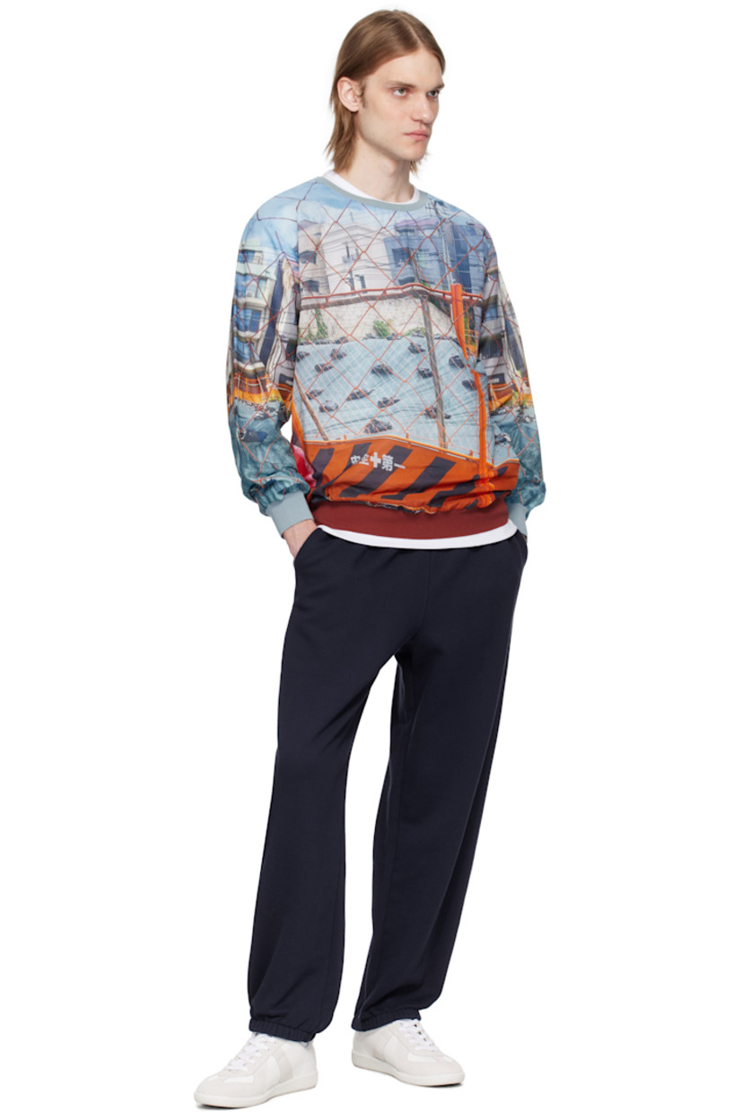 Semi-sheer plain-woven cotton sweatshirt. Graphic printed throughout

· Rib-knit crewneck, hem, and cuffs
· Dropped shoulders

Supplier color: Print