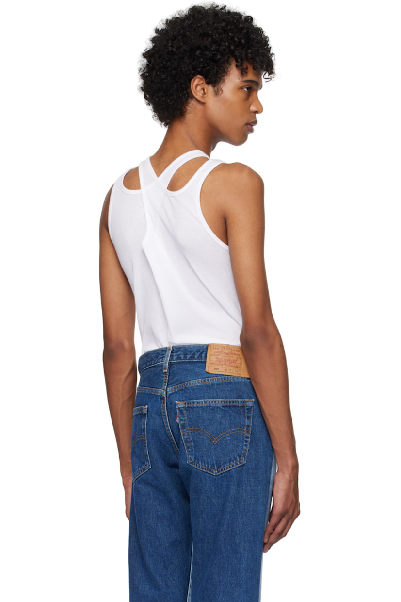 Rib-knit cotton tank top.

· Crewneck 
· Logo hardware at side seam
· Criss-crossing shoulder straps 

Supplier color: White