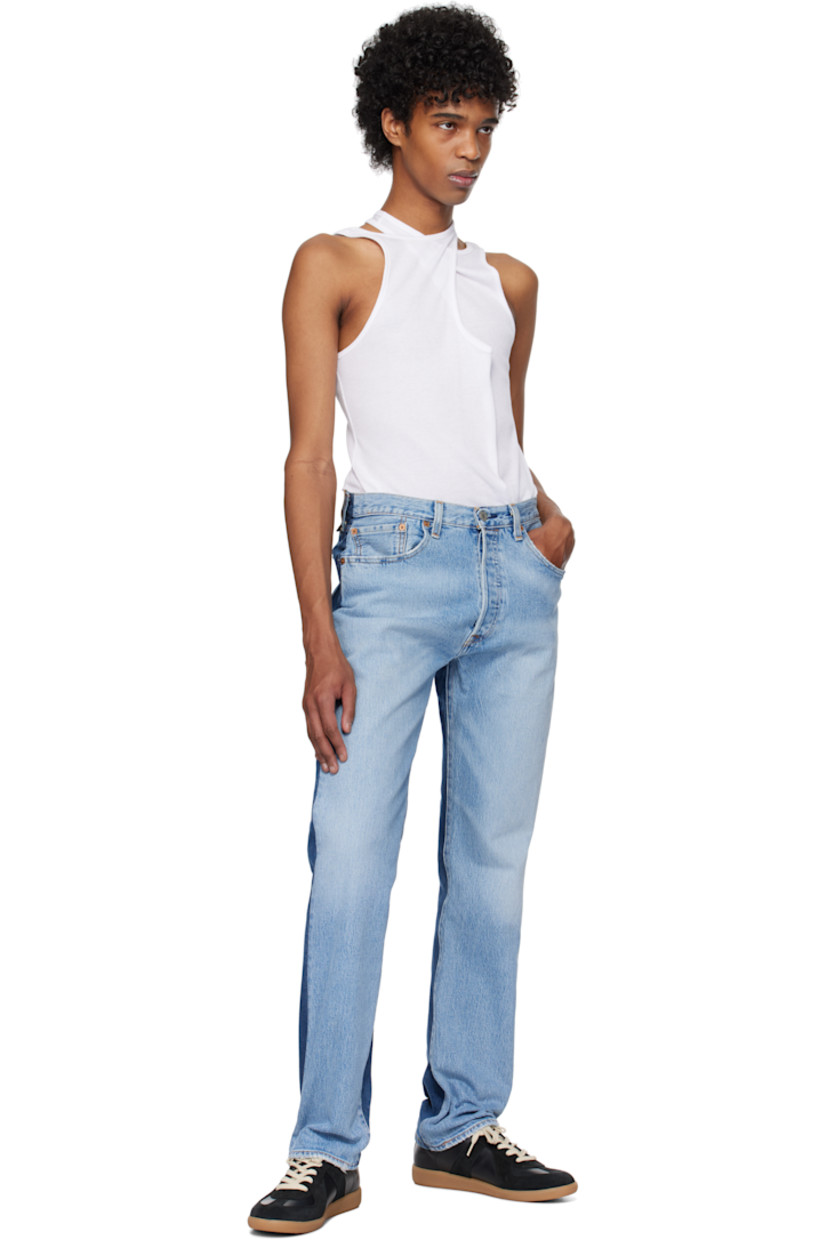 Rib-knit cotton tank top.

· Crewneck 
· Logo hardware at side seam
· Criss-crossing shoulder straps 

Supplier color: White