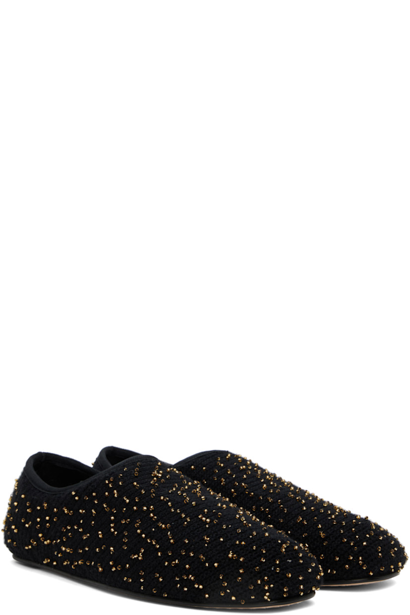 Knit cashmere ballerina flats in black.

· Beaded detailing throughout
· Square toe
· Faille trim at collar
· Buffed leather lining
· Calfskin sole with rubber injection

Supplier color: Black/Gold