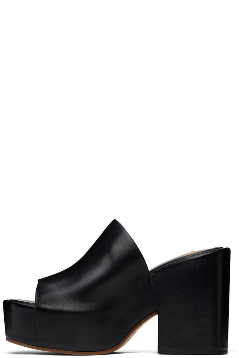 Nappa lambskin mules in black.

· Open toe
· Strap at vamp
· Covered platform midsole and block heel
· Polished calfskin sole with rubber injection
· Platform: H1.75"
· Heel: H4.25"

Supplier color: Black