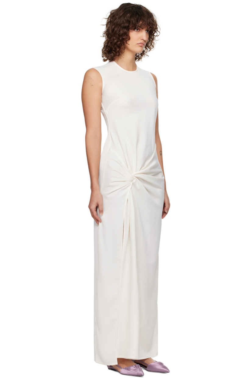 Recycled polyester satin maxi dress.  Draping throughout.

· Round neck 
· Darts at chest
· Slit at hem
· Twisted detailing at side seam
· Concealed zip closure at back
· Unlined 

Supplier color: Porcelain