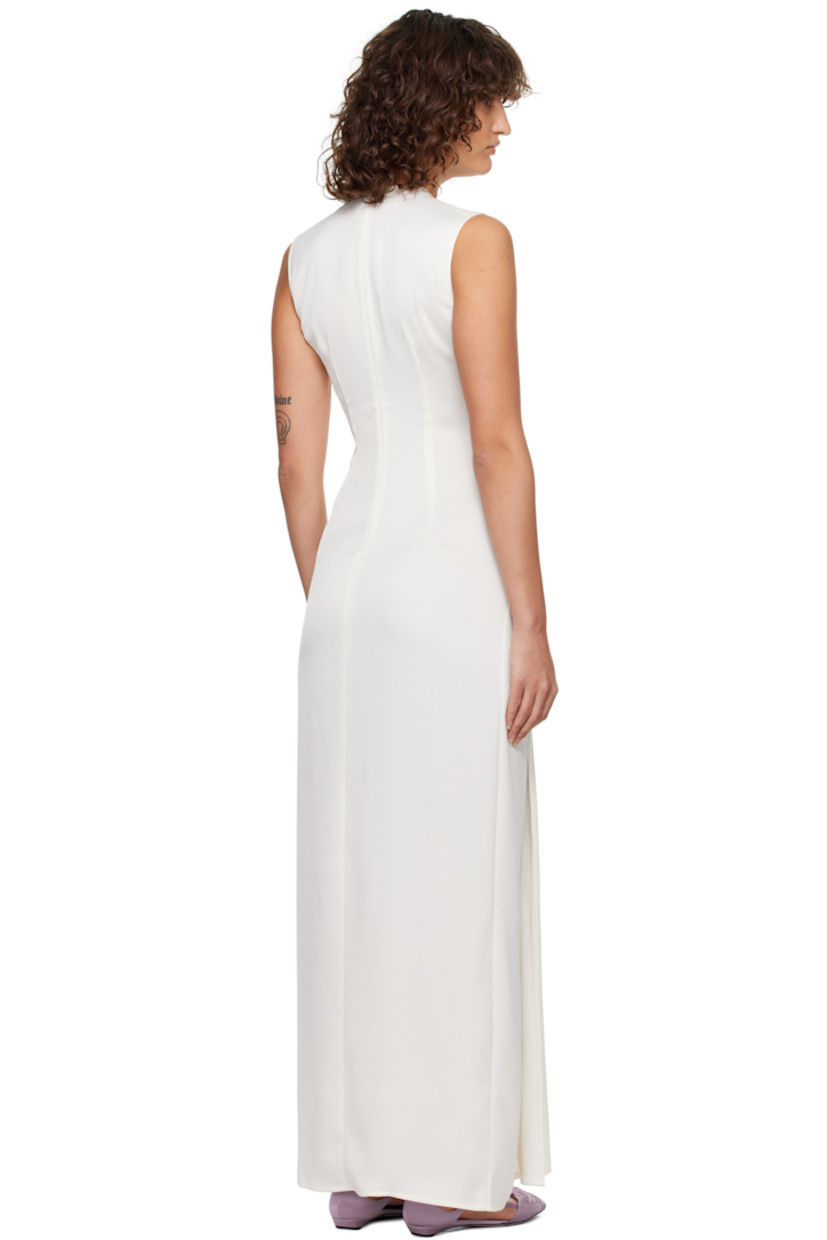 Recycled polyester satin maxi dress.  Draping throughout.

· Round neck 
· Darts at chest
· Slit at hem
· Twisted detailing at side seam
· Concealed zip closure at back
· Unlined 

Supplier color: Porcelain