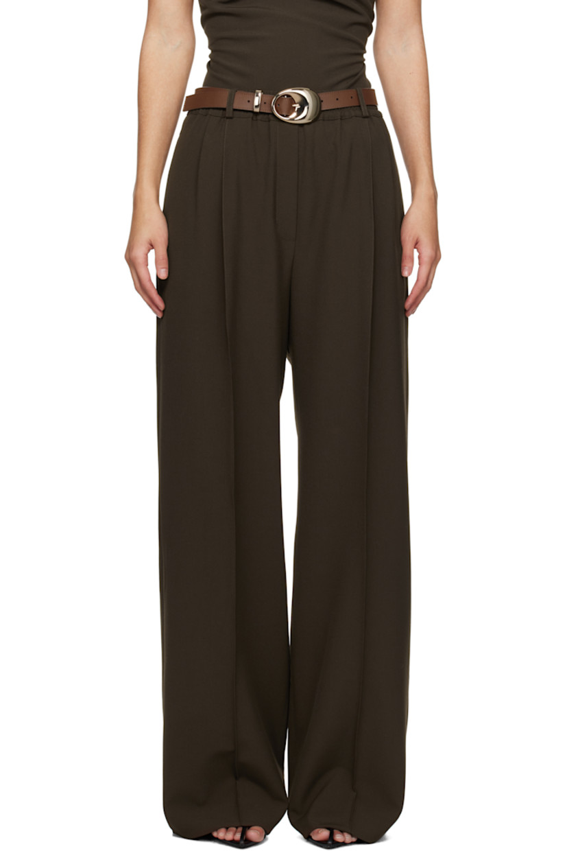 Plain-woven stretch polyester- and viscose-blend trousers.

· Belt loops at elasticized waistband
· Four-pocket styling
· Zip-fly
· Pleats at front
· Creased legs

Supplier color: Dark khaki