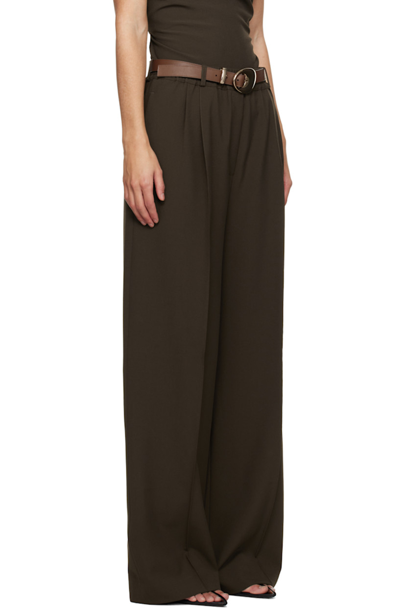 Plain-woven stretch polyester- and viscose-blend trousers.

· Belt loops at elasticized waistband
· Four-pocket styling
· Zip-fly
· Pleats at front
· Creased legs

Supplier color: Dark khaki