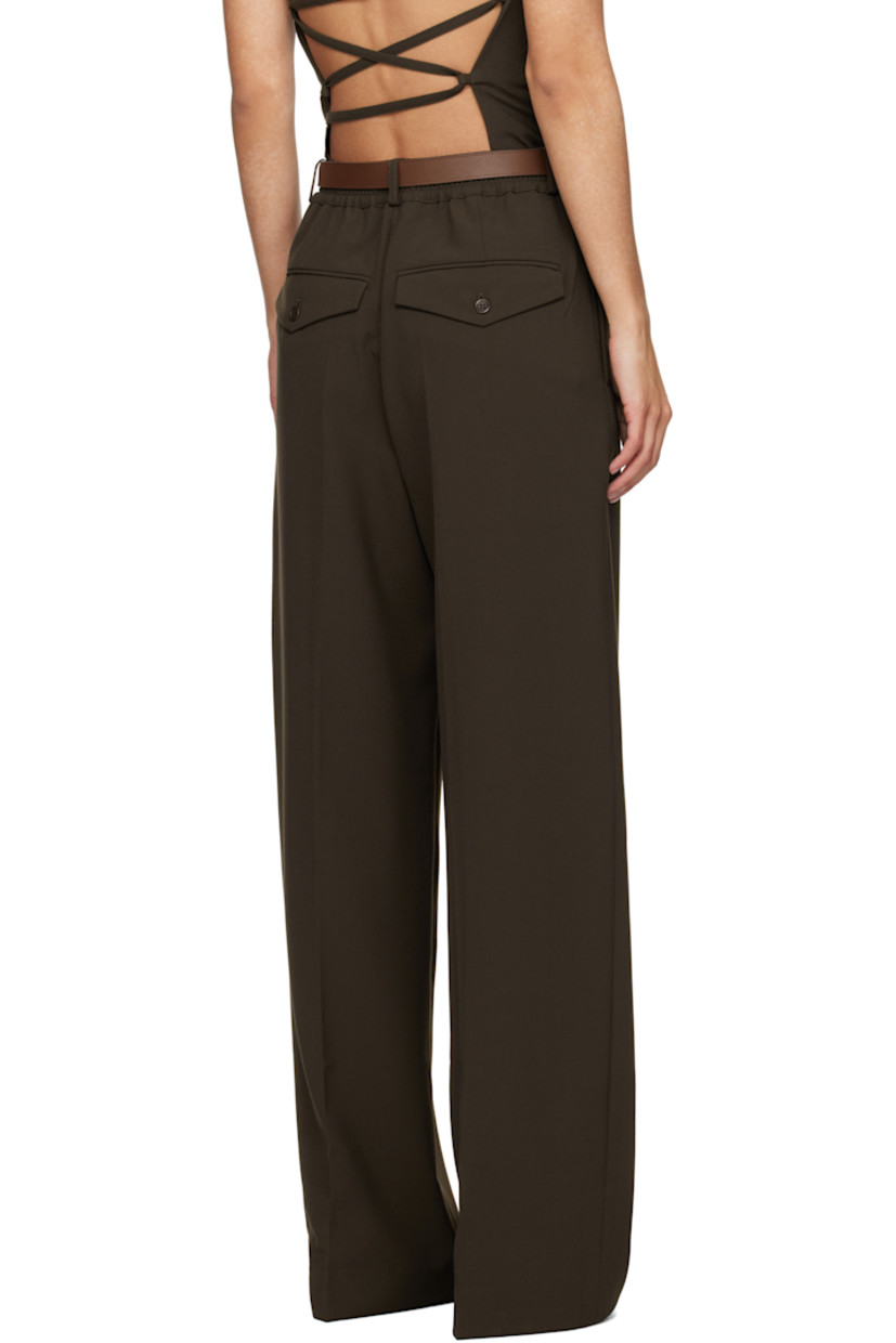Plain-woven stretch polyester- and viscose-blend trousers.

· Belt loops at elasticized waistband
· Four-pocket styling
· Zip-fly
· Pleats at front
· Creased legs

Supplier color: Dark khaki